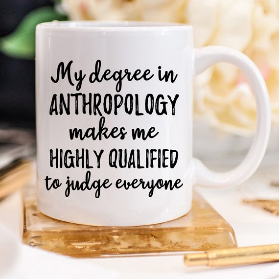 A stylish white anthropology mug featuring a vibrant design printed on both sides, crafted from high-grade ceramic, perfect for coffee lovers.