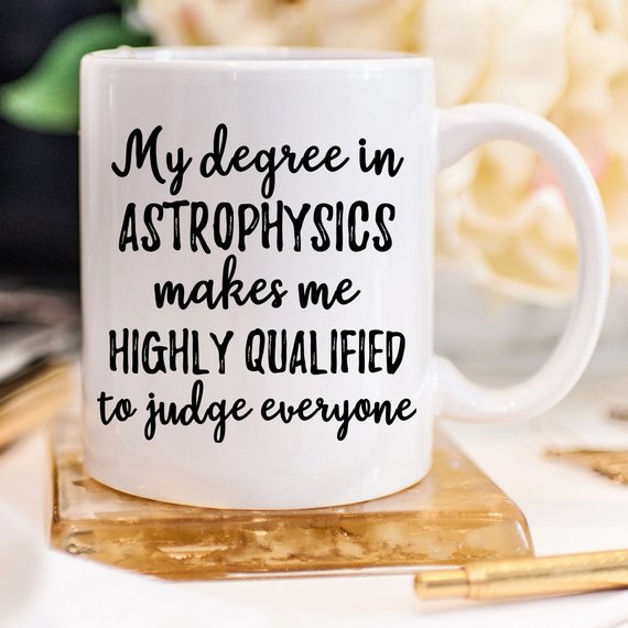 Astrophysics Mug featuring vibrant cosmic design on both sides, crafted from high-grade ceramic.