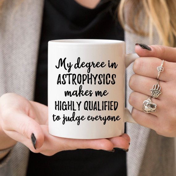 Astrophysics Mug featuring vibrant cosmic design on both sides, crafted from high-grade ceramic.