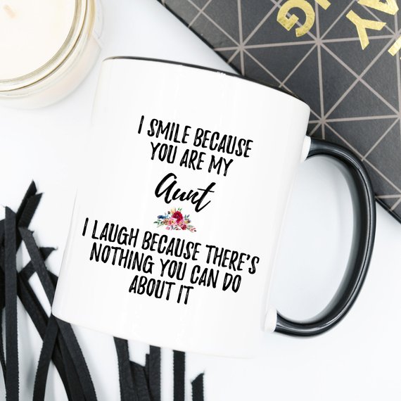 A beautiful white ceramic mug designed for aunts, featuring a vibrant printed design on both sides, available in 11 and 15 oz sizes.