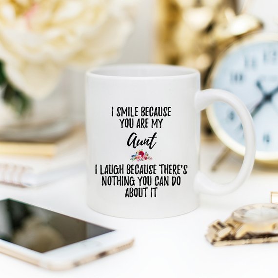 A beautiful white ceramic mug designed for aunts, featuring a vibrant printed design on both sides, available in 11 and 15 oz sizes.