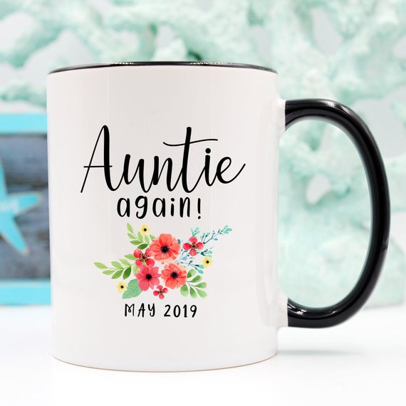 Aunt Pregnancy Announcement Cup featuring a vibrant design, crafted from high-grade ceramic, available in 11 and 15 oz sizes.