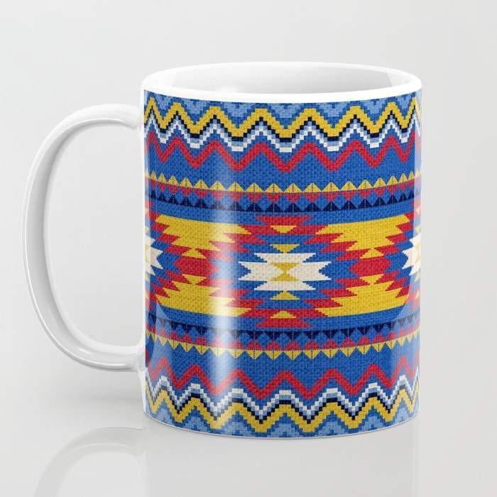 A vibrant Aztec Pattern Mug showcasing intricate designs, featuring a large handle for easy gripping, perfect for hot or cold beverages.