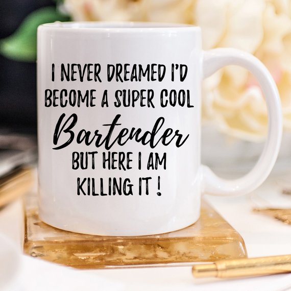 A white ceramic Bartender Mug featuring a funny design, suitable for gifting bartenders, showcasing vibrant colors and high-quality print.