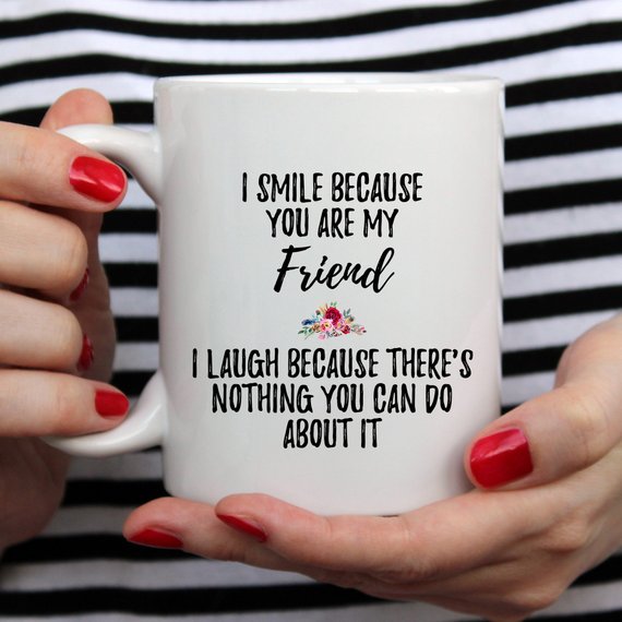 A stylish white ceramic mug designed for best friends, featuring a vibrant printed design on both sides.