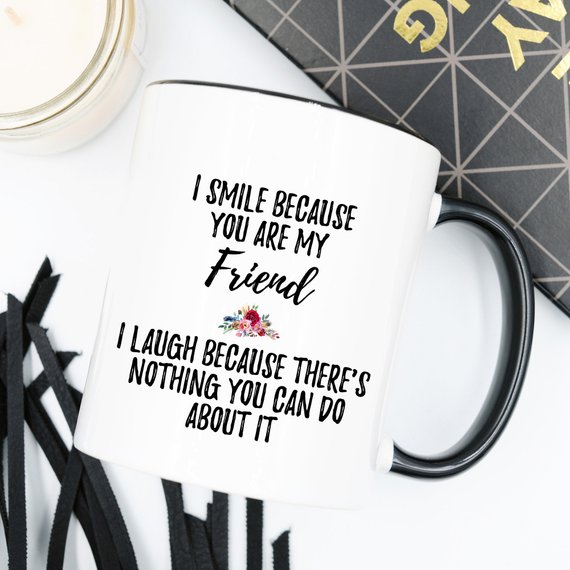 A stylish white ceramic mug designed for best friends, featuring a vibrant printed design on both sides.