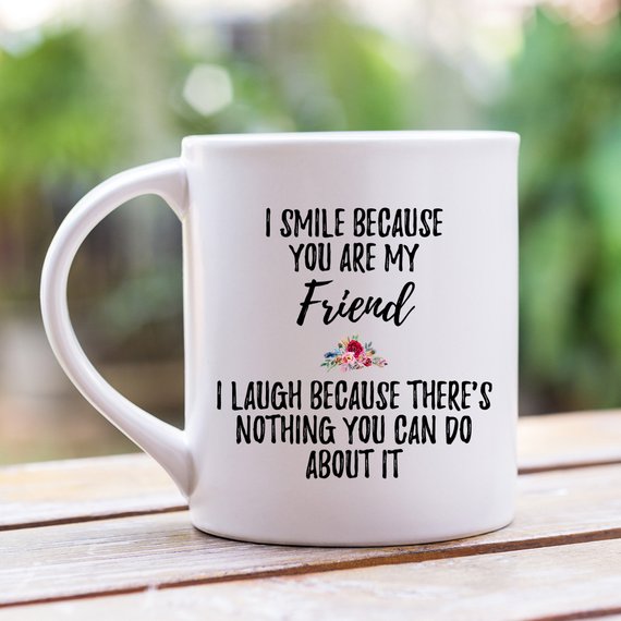 A stylish white ceramic mug designed for best friends, featuring a vibrant printed design on both sides.