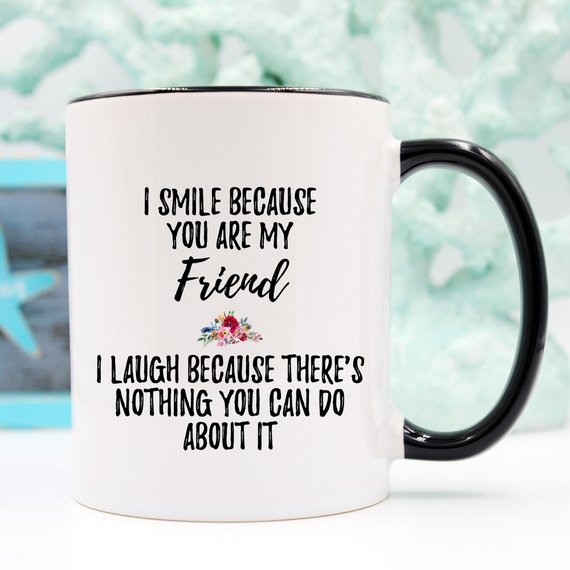 A stylish white ceramic mug designed for best friends, featuring a vibrant printed design on both sides.