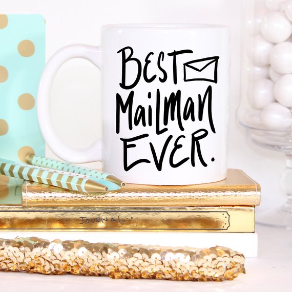 A ceramic coffee mug featuring the text 'Best Mail Man Ever' in a fun design, perfect for postal workers and coffee lovers.