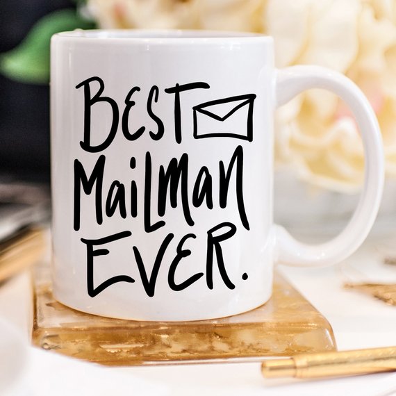 A ceramic coffee mug featuring the text 'Best Mail Man Ever' in a fun design, perfect for postal workers and coffee lovers.