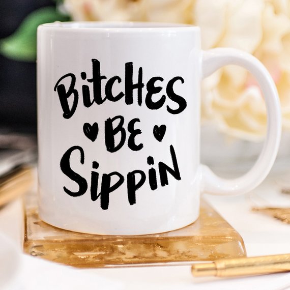 Bitches Be Sippin Funny Coffee Mug with humorous design, perfect for coffee lovers.