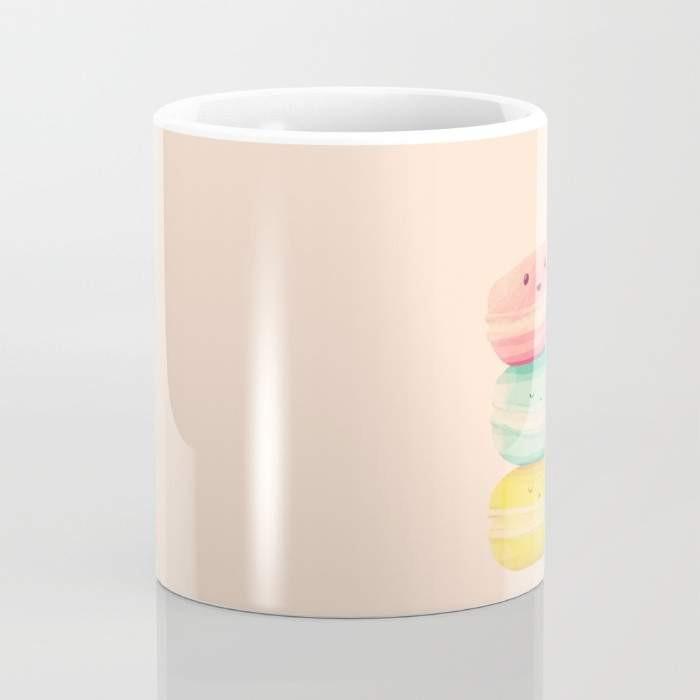 A stylish 15-ounce ceramic coffee mug with a unique 'Bite Me' wrap-around design and a large handle for easy gripping.