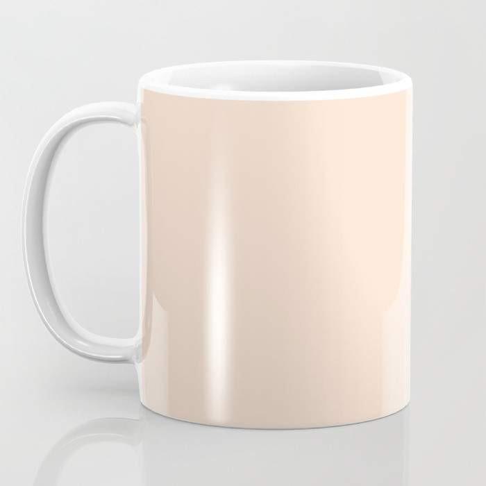 A stylish 15-ounce ceramic coffee mug with a unique 'Bite Me' wrap-around design and a large handle for easy gripping.