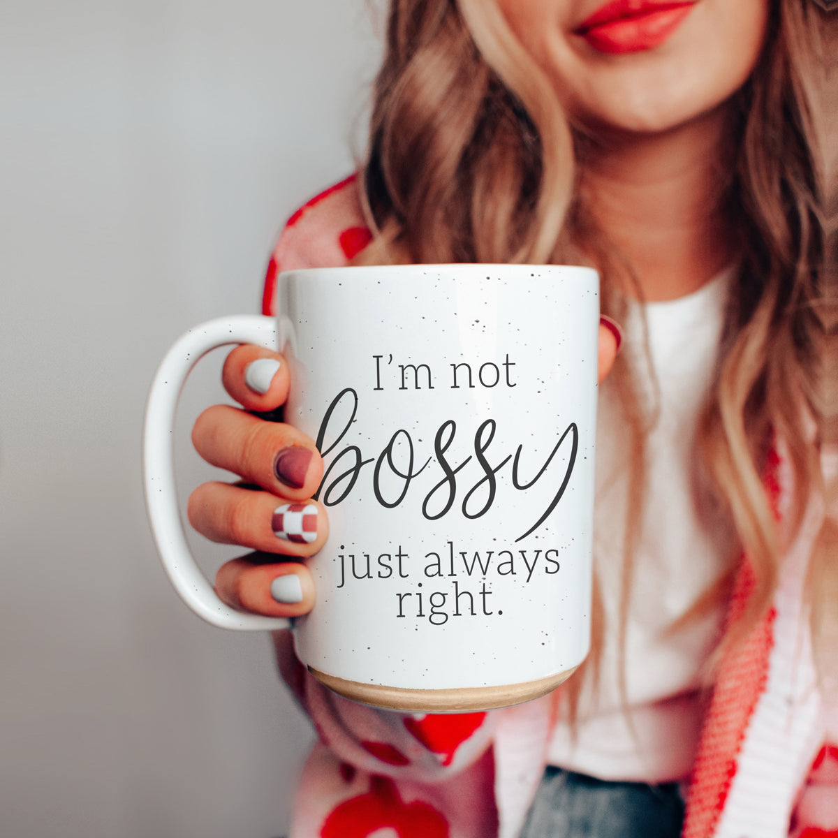 A stylish off-white ceramic coffee mug with dark speckles, featuring the bold text 'I'm Not Bossy, Just Always Right' on both sides.