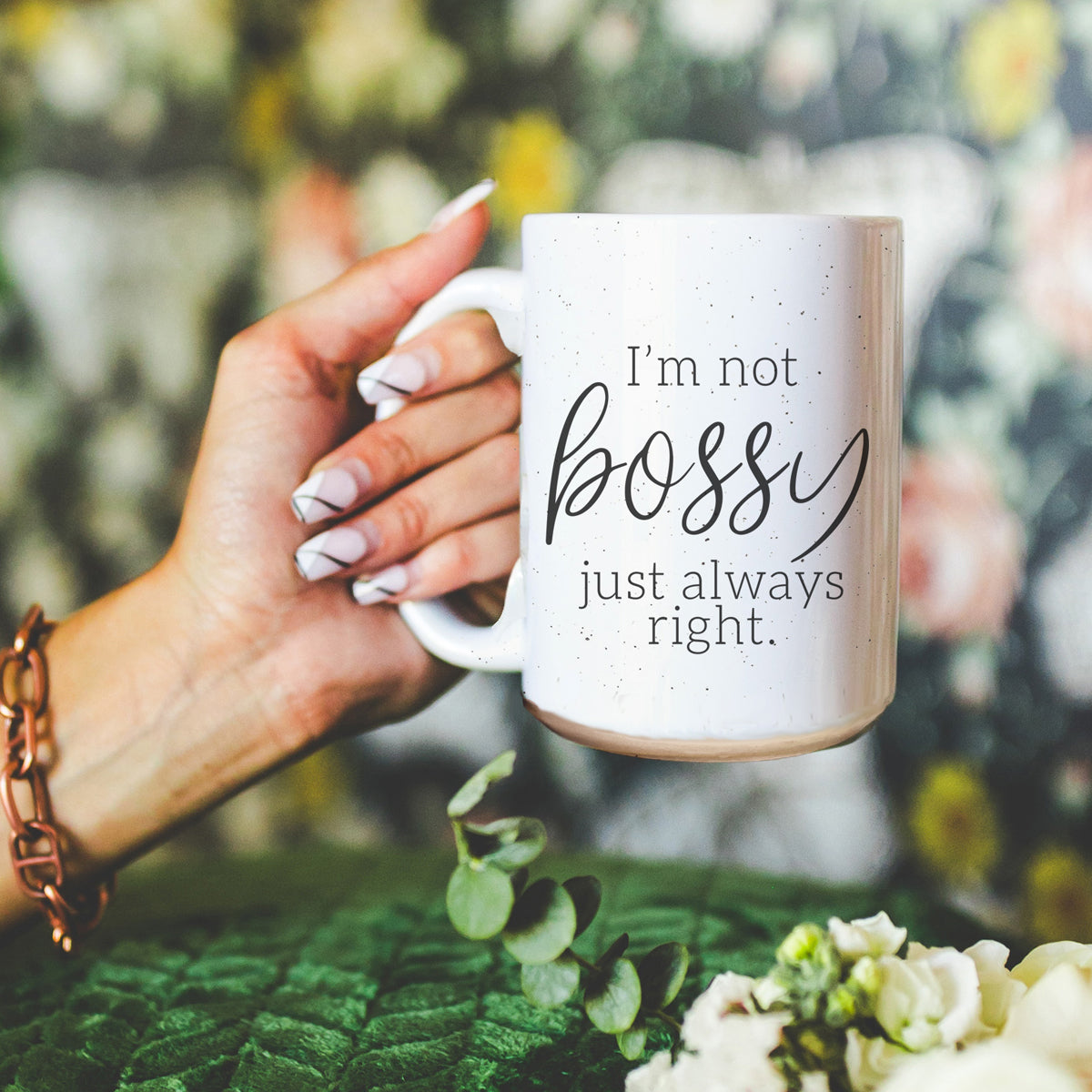 A stylish off-white ceramic coffee mug with dark speckles, featuring the bold text 'I'm Not Bossy, Just Always Right' on both sides.