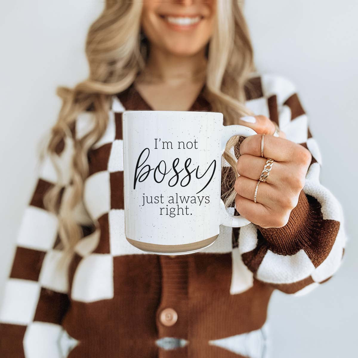 A stylish off-white ceramic coffee mug with dark speckles, featuring the bold text 'I'm Not Bossy, Just Always Right' on both sides.