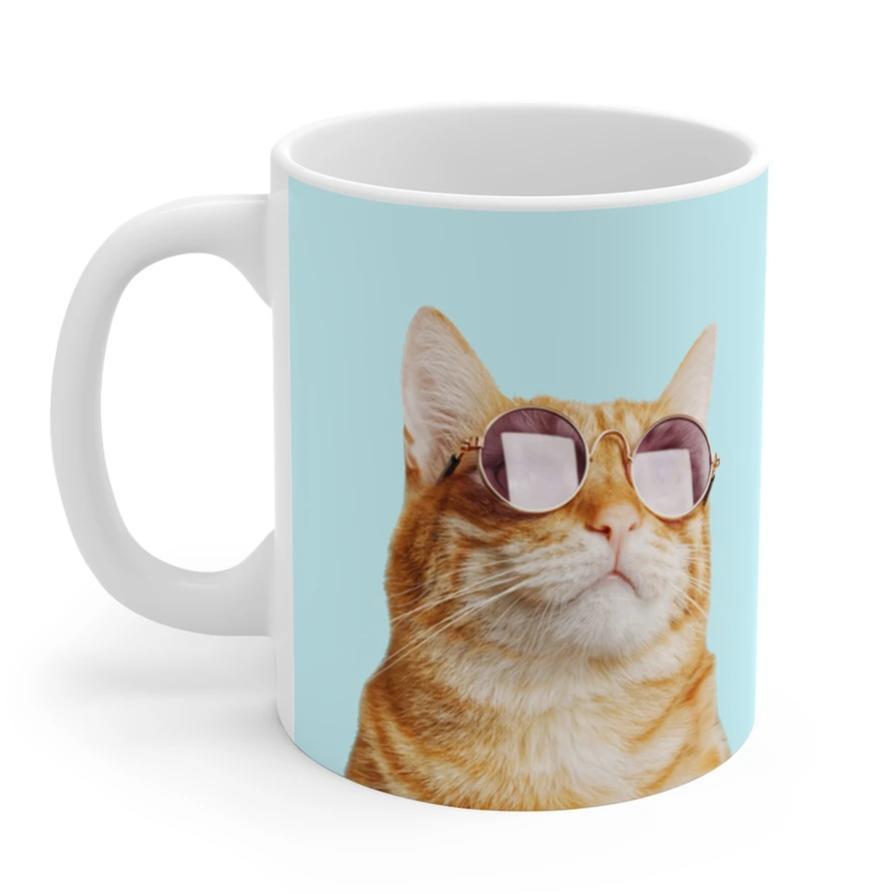 A white ceramic coffee mug with the phrase 'Cat Is Always Right' printed on it, featuring a C-handle and rounded corners.