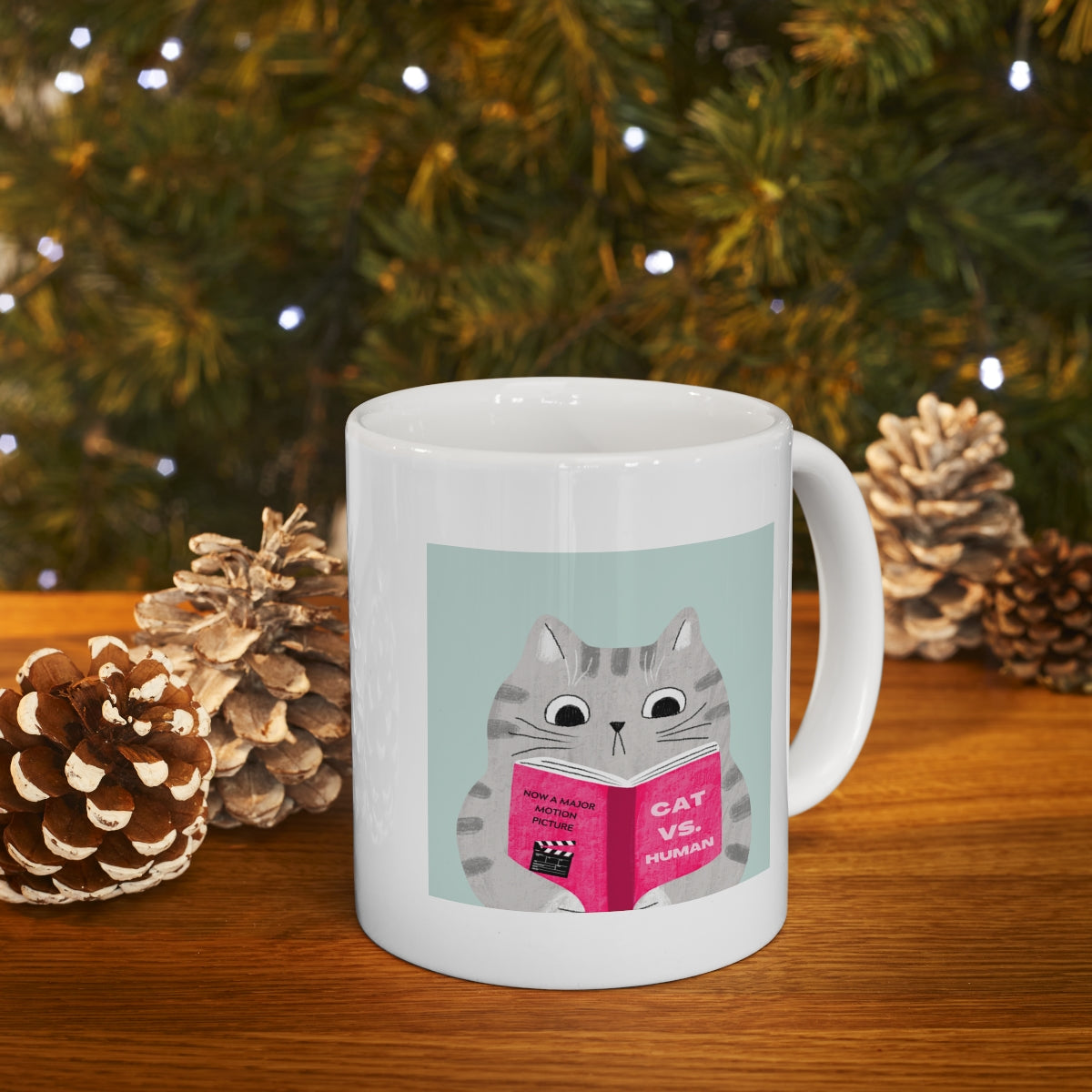 A humorous Cat Vs. Human Funny Mug made of white ceramic, featuring a playful design, perfect for coffee and tea lovers.