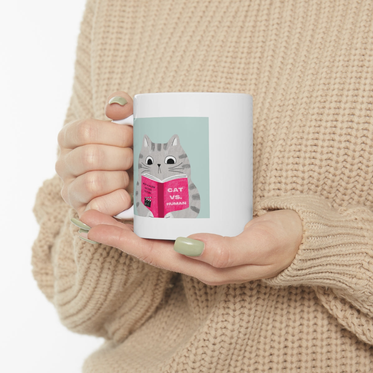 A humorous Cat Vs. Human Funny Mug made of white ceramic, featuring a playful design, perfect for coffee and tea lovers.