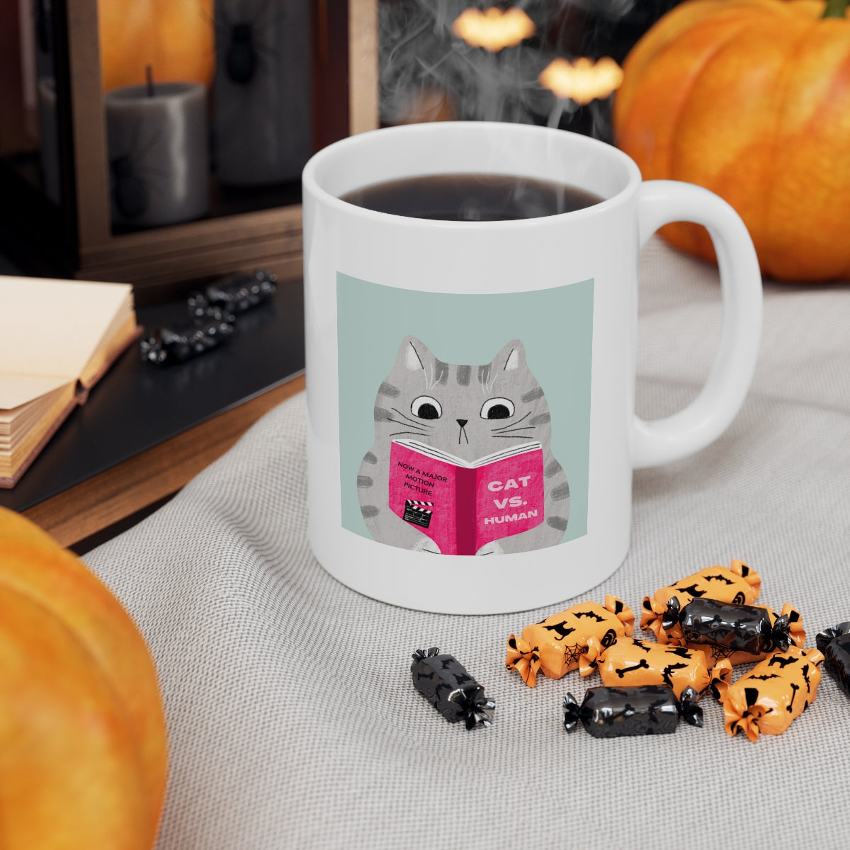 A humorous Cat Vs. Human Funny Mug made of white ceramic, featuring a playful design, perfect for coffee and tea lovers.