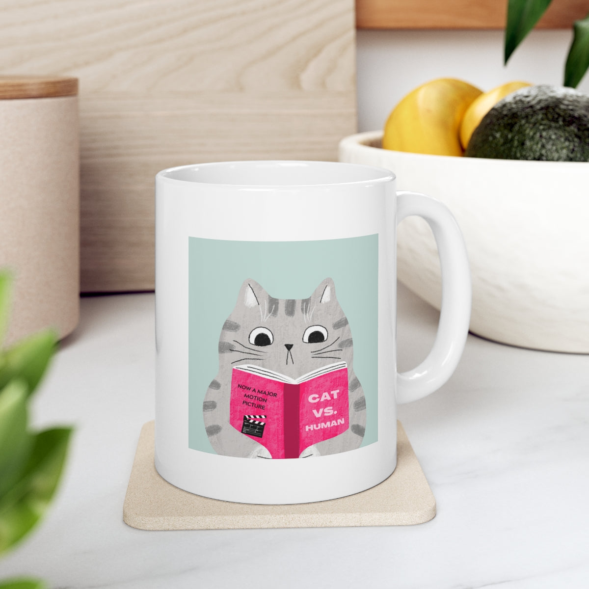 A humorous Cat Vs. Human Funny Mug made of white ceramic, featuring a playful design, perfect for coffee and tea lovers.