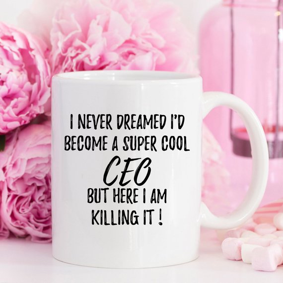 A stylish white CEO mug with a vibrant design printed on both sides, perfect for entrepreneurs and professionals.