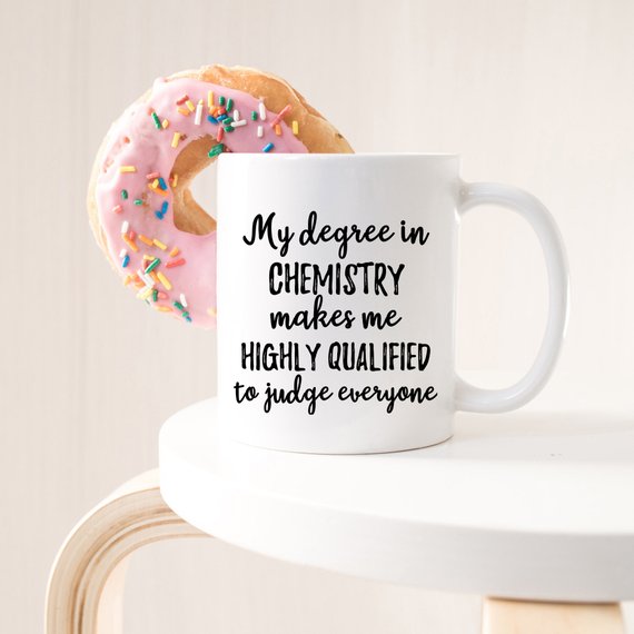 A white ceramic Chemist Mug featuring a vibrant design on both sides, perfect for science lovers.