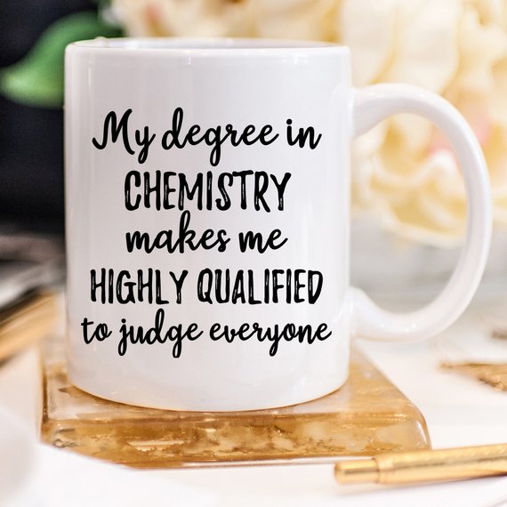 A white ceramic Chemist Mug featuring a vibrant design on both sides, perfect for science lovers.