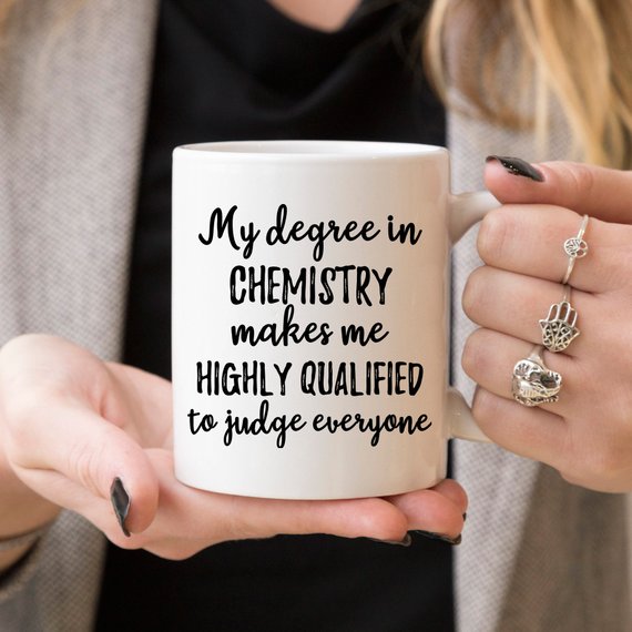 A white ceramic Chemist Mug featuring a vibrant design on both sides, perfect for science lovers.