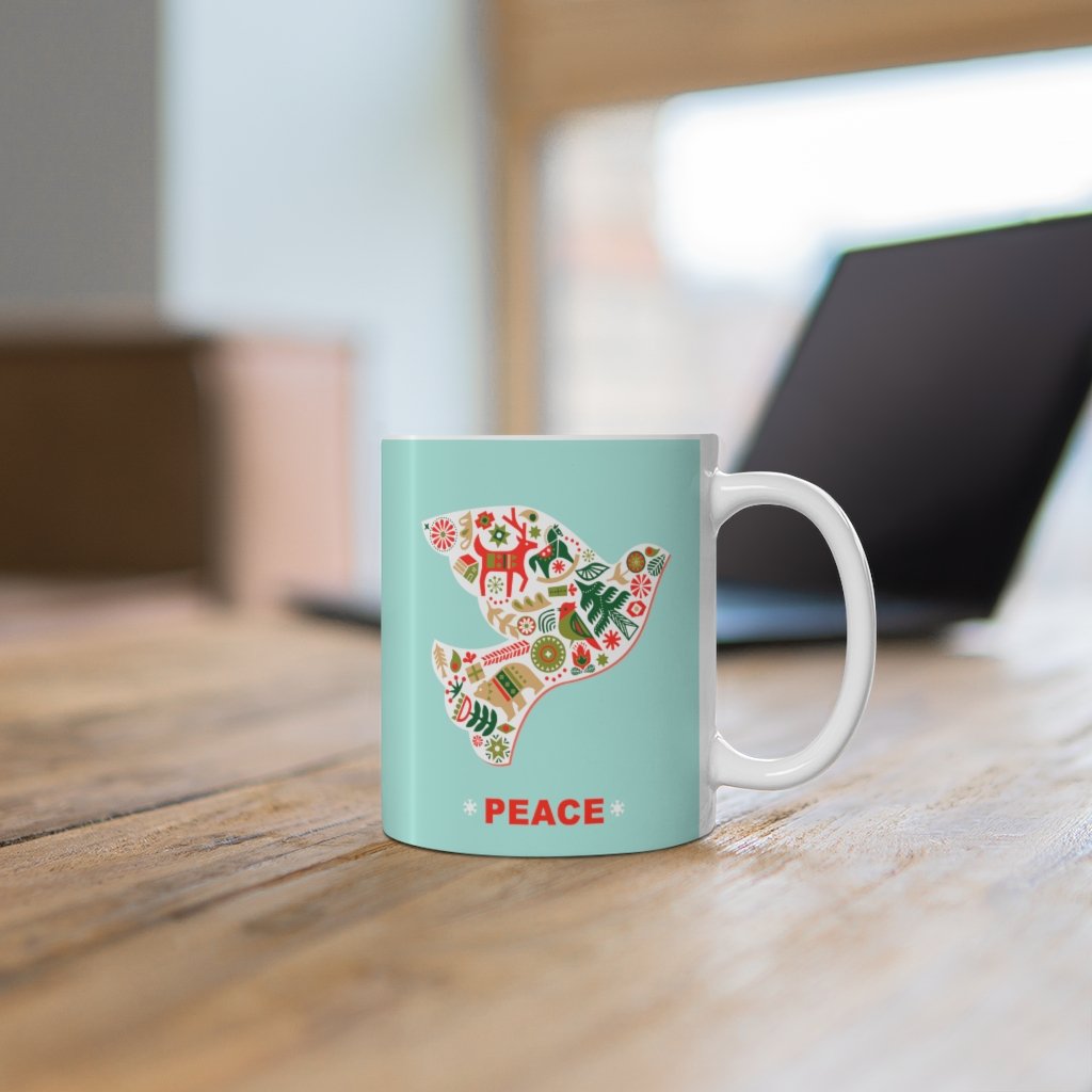 A white ceramic mug featuring a Christmas dove design, perfect for holiday beverages.