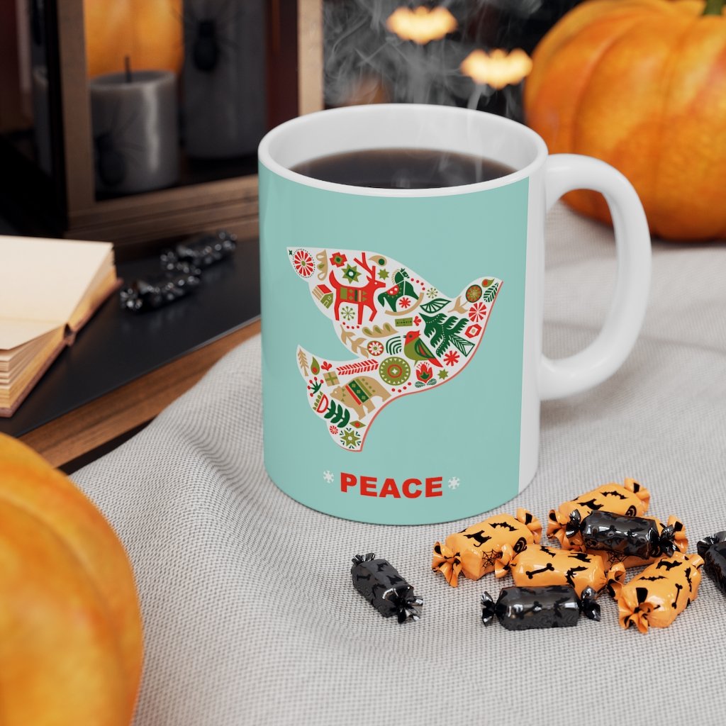 A white ceramic mug featuring a Christmas dove design, perfect for holiday beverages.