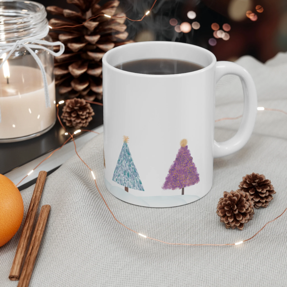 A festive Christmas Tree Holiday Mug made of white ceramic, featuring various holiday tree designs, perfect for hot beverages.