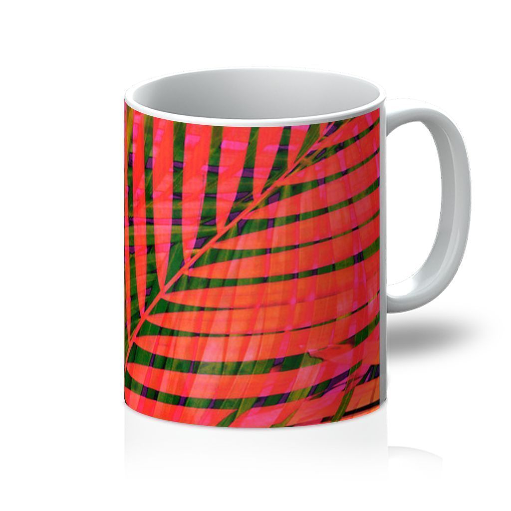 Colorful Tropical Leaves Mug featuring vibrant leaf designs on a glossy ceramic surface, perfect for coffee and tea lovers.