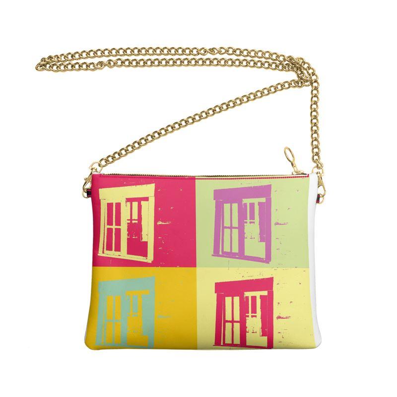 Colorful Cross Body Bag With Chain featuring abstract Pop Art design, detachable chain strap, and round metal zip pull.