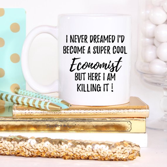 A white ceramic mug featuring a vibrant economist-themed design printed on both sides, perfect for coffee or tea.