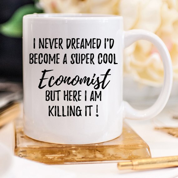 A white ceramic mug featuring a vibrant economist-themed design printed on both sides, perfect for coffee or tea.