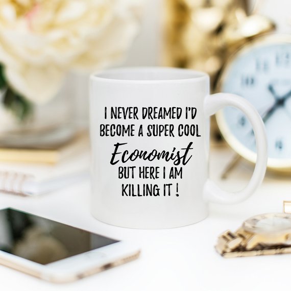 A white ceramic mug featuring a vibrant economist-themed design printed on both sides, perfect for coffee or tea.