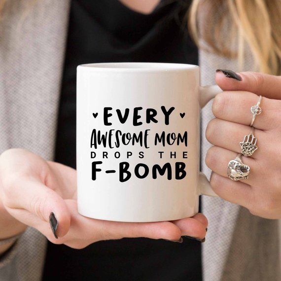 Every Awesome Mom Drops the F Bomb Mug, white ceramic mug with humorous text printed on both sides.