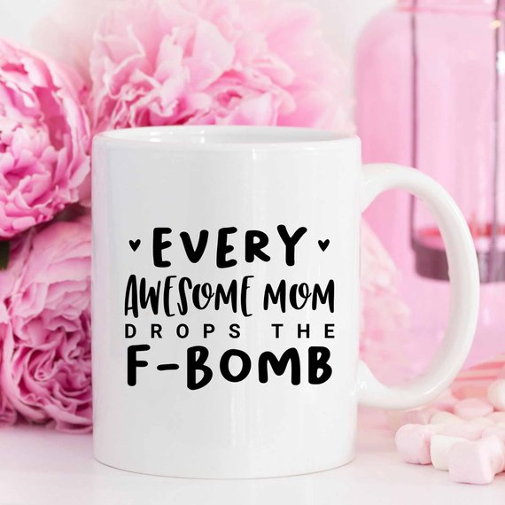 Every Awesome Mom Drops the F Bomb Mug, white ceramic mug with humorous text printed on both sides.