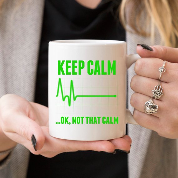 Funny Nurse Mug with humorous text 'Keep C, Not That Calm', perfect for coffee lovers and nurses.