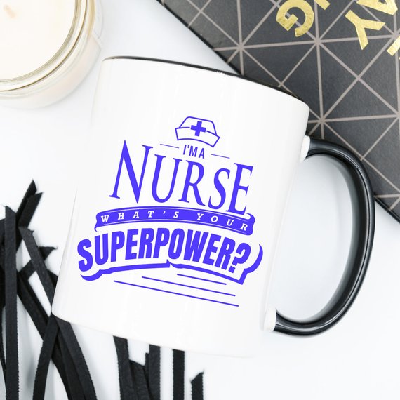 Funny Nurse Mug featuring the text 'I'm A Nurse, What's Your Superpower?' in bold letters, perfect for coffee lovers.