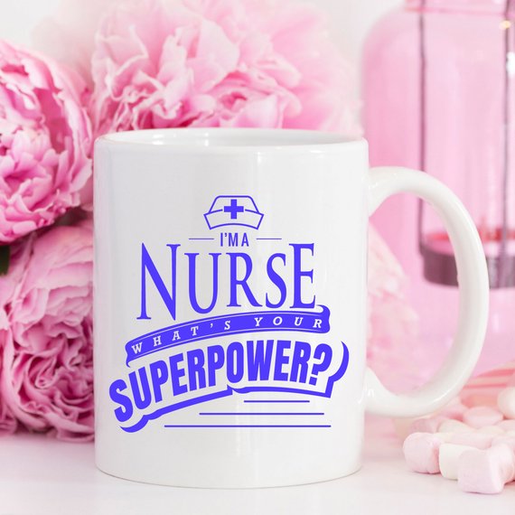 Funny Nurse Mug featuring the text 'I'm A Nurse, What's Your Superpower?' in bold letters, perfect for coffee lovers.