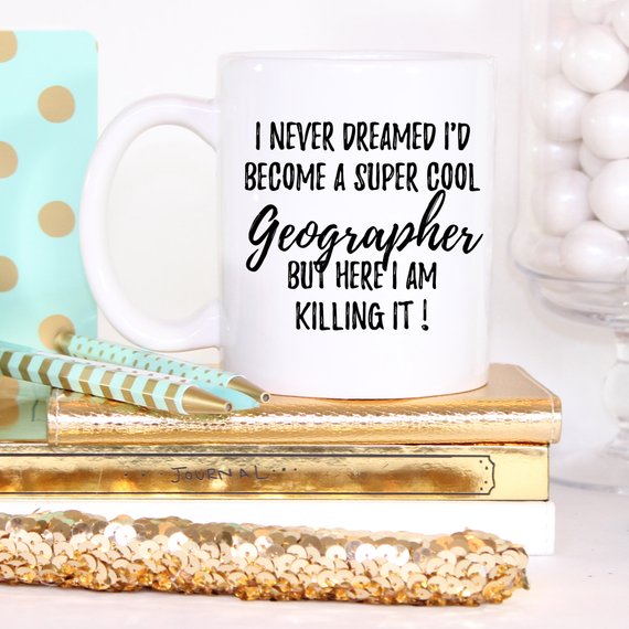 Geographer Mug featuring a vibrant design on both sides, crafted from high-grade ceramic, ideal for coffee or tea lovers.