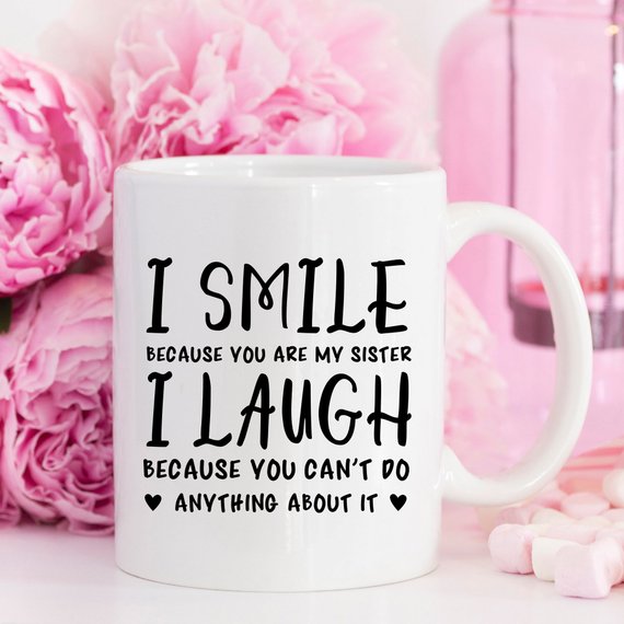 Funny coffee mug with a humorous quote for sisters, showcasing a playful design and high-quality ceramic material.