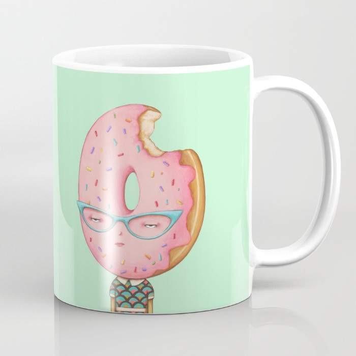 A colorful ceramic coffee mug featuring a whimsical sprinkle design, perfect for enjoying hot or cold beverages.