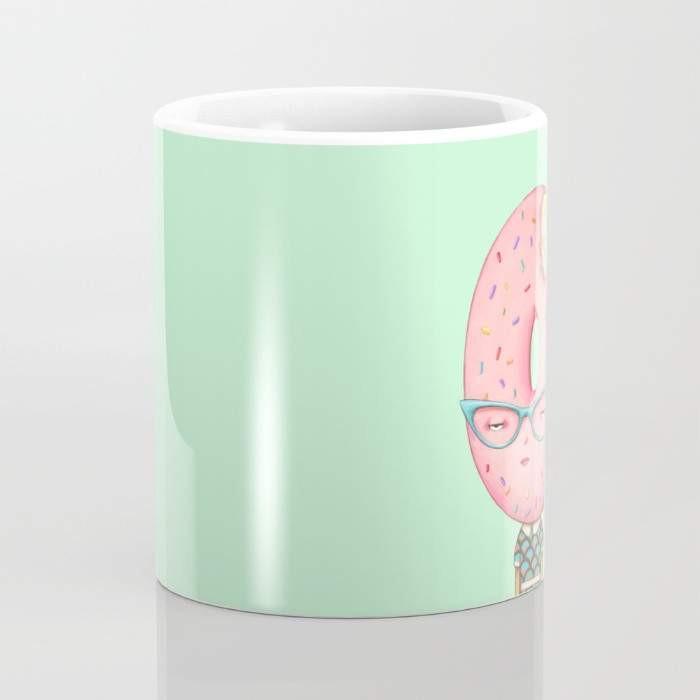 A colorful ceramic coffee mug featuring a whimsical sprinkle design, perfect for enjoying hot or cold beverages.