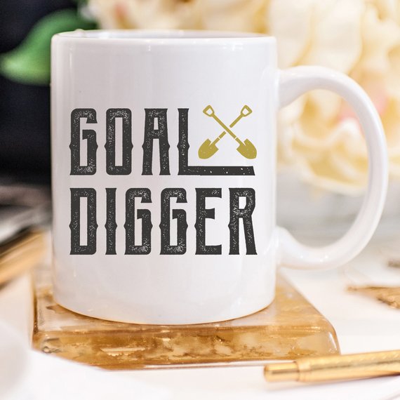 A stylish Goal Digger Mug featuring a humorous design, perfect for entrepreneurs and girl bosses, made from high-quality ceramic.