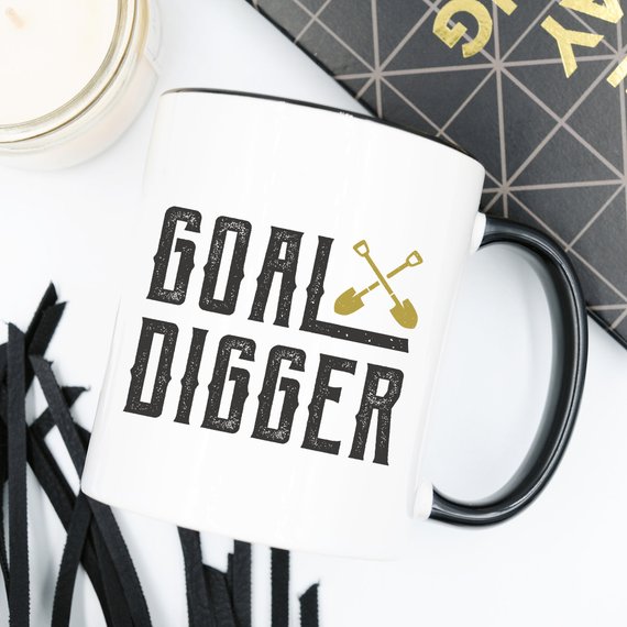 A stylish Goal Digger Mug featuring a humorous design, perfect for entrepreneurs and girl bosses, made from high-quality ceramic.