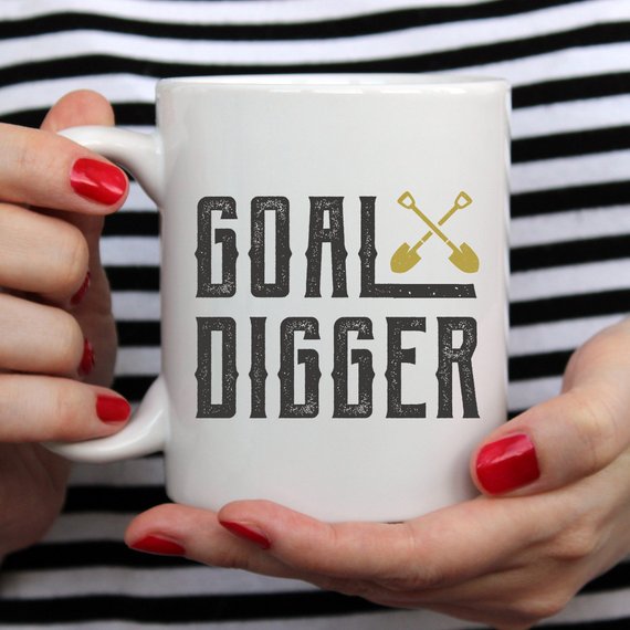 A stylish Goal Digger Mug featuring a humorous design, perfect for entrepreneurs and girl bosses, made from high-quality ceramic.