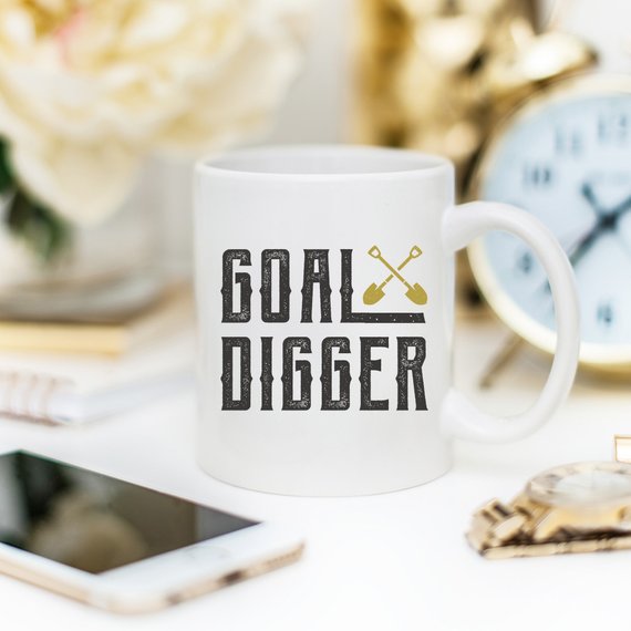 A stylish Goal Digger Mug featuring a humorous design, perfect for entrepreneurs and girl bosses, made from high-quality ceramic.